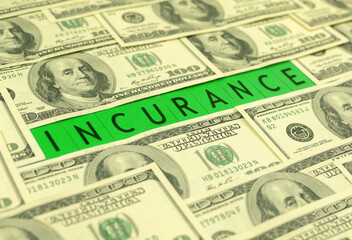 Insurance and US dollar bills on the table, business and economic concept background photo