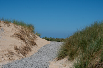 road through sand dunes