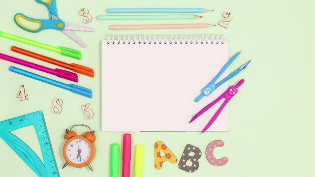 Back to school writing stationery move around copy space notebook. Stop motion