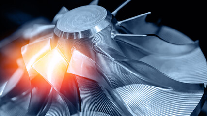 Fototapeta Macro steel blades of turbine propeller blue color with sunlight obraz