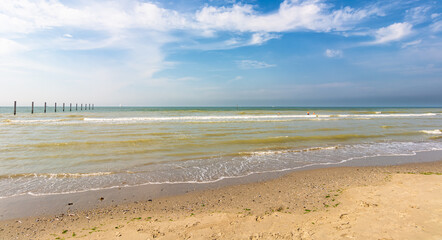 beautiful summer day	at Nieuwpoort, Belgium. Panorama beach view with blue sky