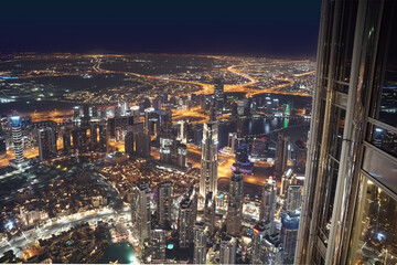 Aerial view of Dubai city at night.