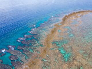 Fototapeta na wymiar 沖縄の瀬底島、水納島、伊江島周辺のビーチのドローン空撮写真