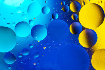 Bubbles of oxygen in water. Water structure. Blue and yellow abstract water bubbles texture...