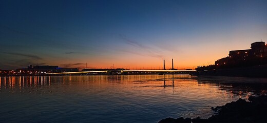 Naklejka premium sunset over the river
