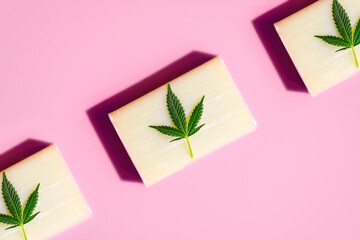 CBD Cannabidiol infused soap on pink background, concept of the use of Hemp in skin personal hygiene products