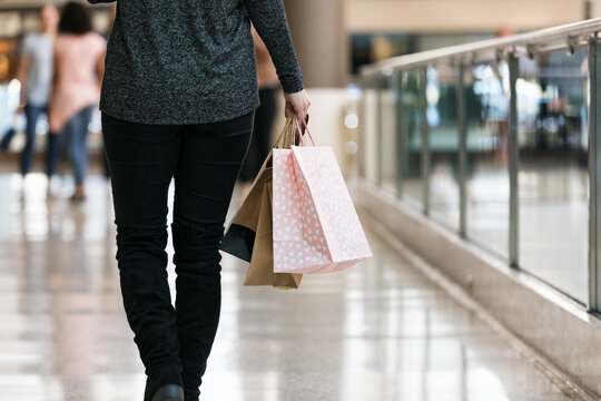 Mall: Anonymous Woman Walking Through Mall With Bags