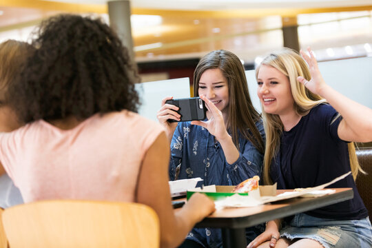 Mall: Teen Girls In Food Court Using Phone To Take Photos Of Eac