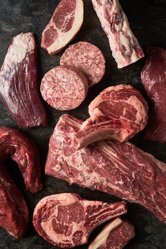 Set of raw meat pieces in butchery