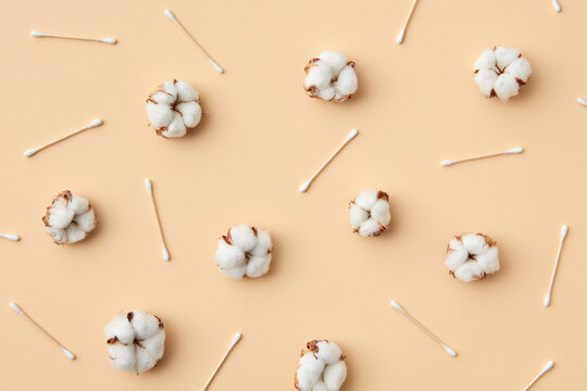 Flatlay of cotton flowers and ear sticks