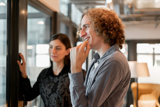 Office Workers Using Board
