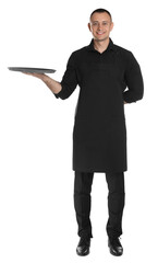 Full length portrait of happy young waiter with tray on white background