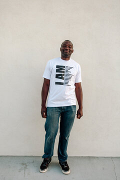 Tall Black man wearing t-shirt 