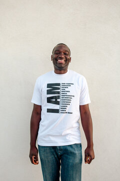 Happy Black man wearing t-shirt 