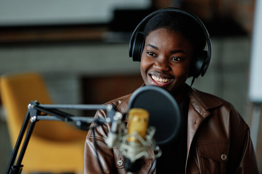 Black woman smiling during communication 