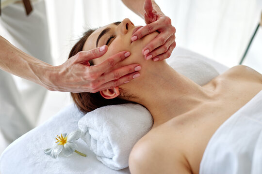 Woman Having Facial Massage