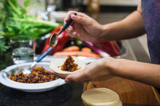 Woman making veggie pasty