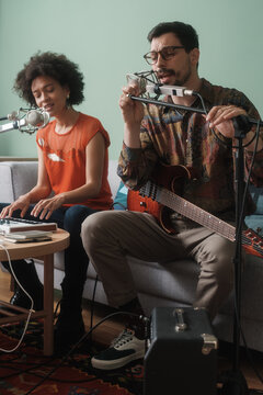 People Singing And Playing Instruments