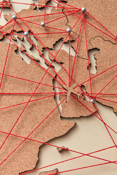 Small plane model on map with red connections