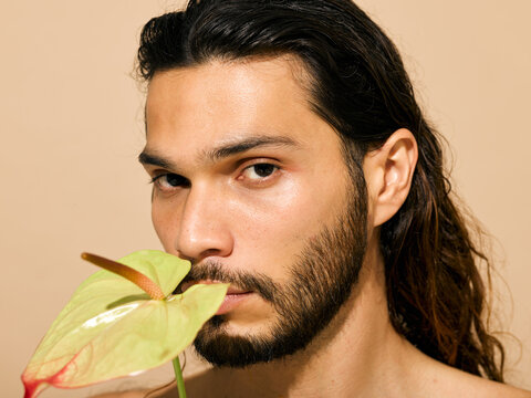 long haired man portrait in studio