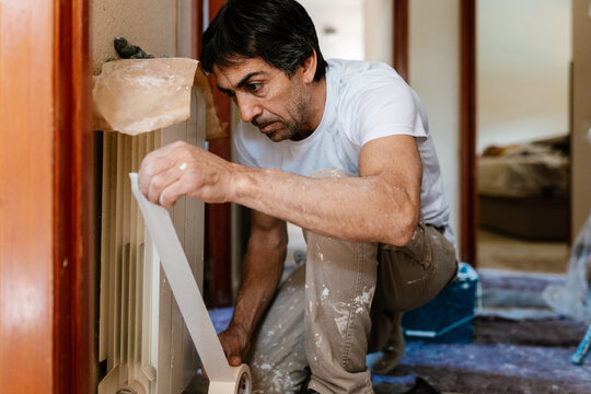 Mason Working in a House