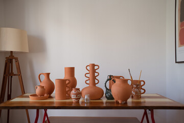 Wooden table with terracotta pottery