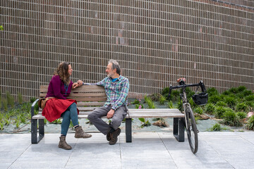 adult couple on a bench