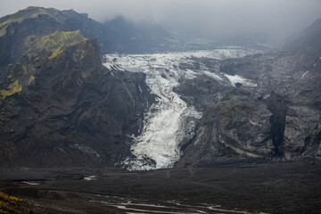 The Gígjökull glacier tumbling down the Eyjafjallajökull volcano ice cap to the wasteland caused by the 2010 eruption, Thórsmörk National Park, Iceland