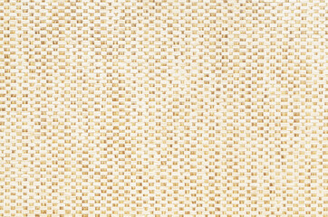 brown beige mesh textile background. Texture of fabric with wood bark woven in a grid pattern