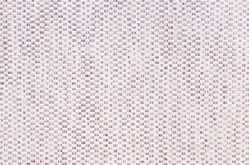 Pink purple mesh textile background. Texture of fabric with wood bark woven in a grid pattern