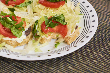 Sopes, Mexican food served on a plate