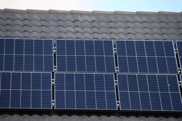 Solar heating panels on a tiled roof, Cranbourne East, Melbourne, Victoria, Australia.