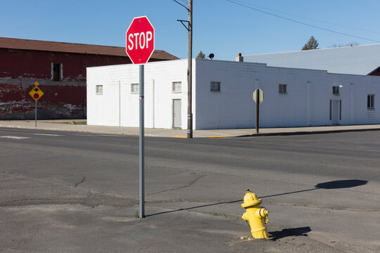 Fire hydrant and stop sign on empty street corner