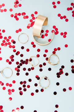 Golden rings, earrings and sparkles 