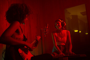 Female Musician Playing Music In The Studio.