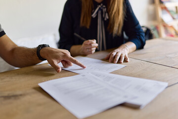 Lawyer reviewing her client's papers