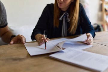 Lawyer reviewing her client's papers