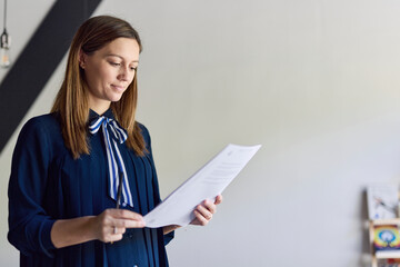 Lawyer reviewing her client's papers