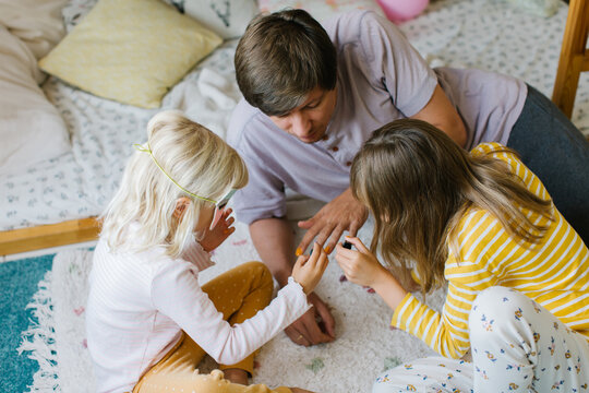 Girls Doing Their Father A Manicure