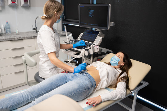 Doctor Examine Patient Using Sonography