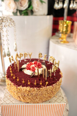 birthday cake with cherry topping, focus in front of the cake