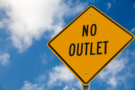 No Outlet warning road sign on a blue sky background. Copy space for your text
