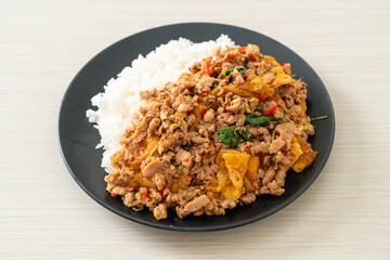 stir-fried minced pork with basil and egg topped on rice