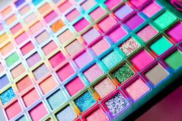 Flat lay of Broken bright multicolor eyeshadow as samples and swatches of cosmetic beauty product isolated on white background.