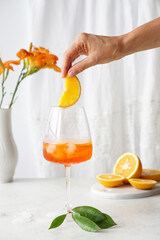 Summer cocktail aperol spritz in a beautiful glass.