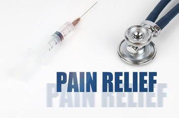 On a white background, a syringe and a stethoscope, next to a double inscription - PAIN RELIEF