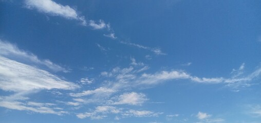 white clouds in the morning sky