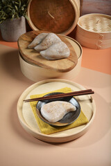 traditional chinese teo chew steam salted sticky rice peach cake kueh snack appetiser food with beautiful display and color halal dim sum menu
