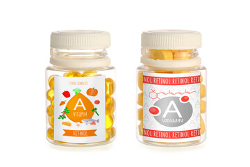 Bottles of vitamin A pills on white background