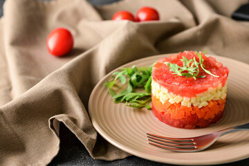 Plate with tasty tartare salad, closeup